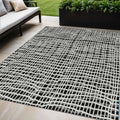 5' X 8' Black Gray And Ivory Striped Washable Indoor Outdoor Area Rug