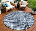 8' Navy Blue And Ivory Round Striped Washable Indoor Outdoor Area Rug