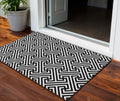 3' X 5' Black And Ivory Geometric Washable Indoor Outdoor Area Rug