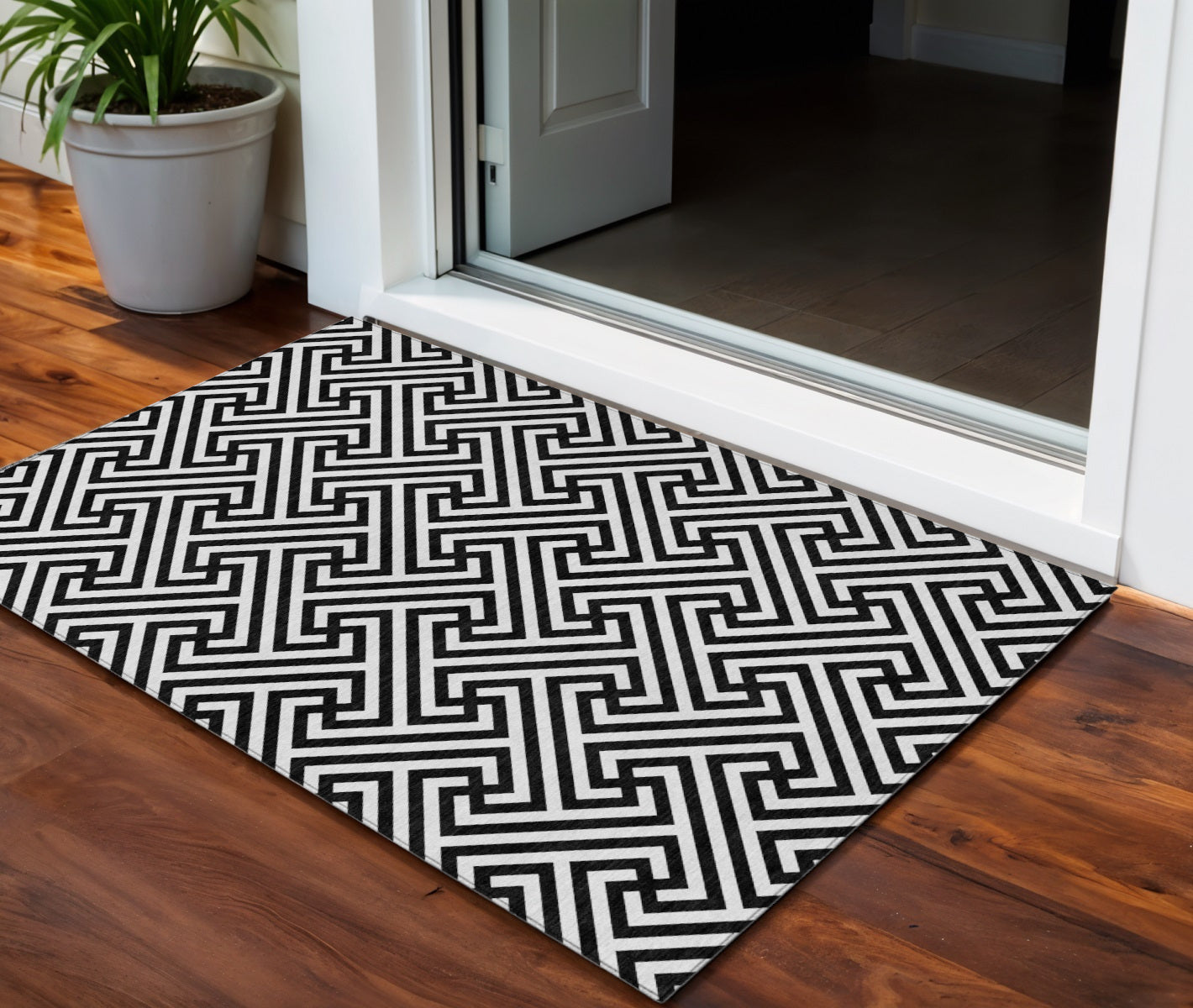 3' X 5' Black And Ivory Geometric Washable Indoor Outdoor Area Rug
