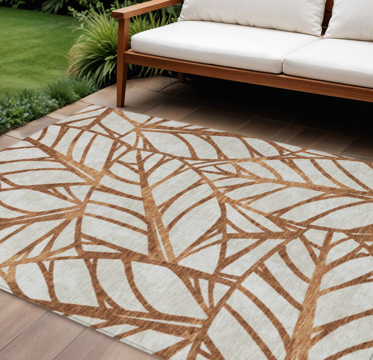 10' X 14' Orange Beige And Copper Floral Washable Indoor Outdoor Area Rug