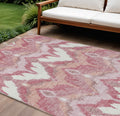 9' X 12' Blush Mauve And Ivory Ikat Washable Indoor Outdoor Area Rug