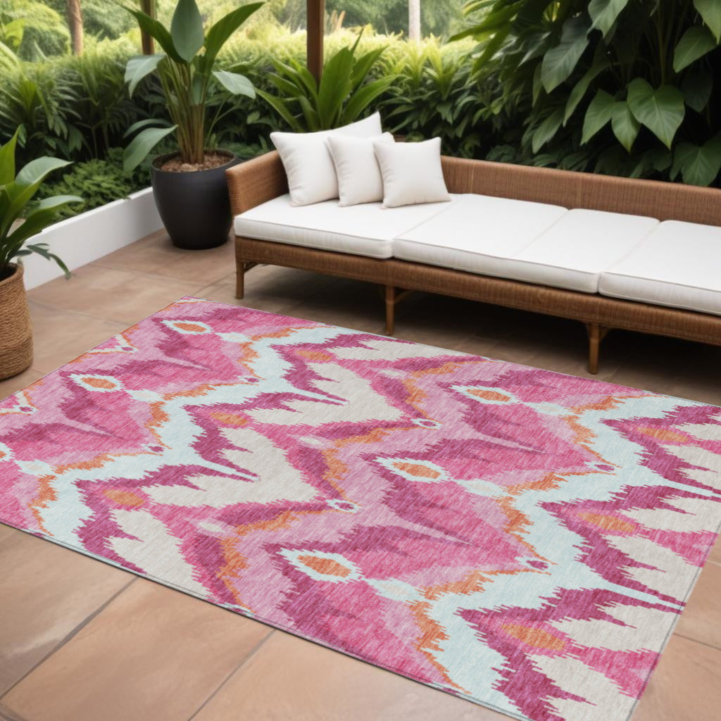 8' X 10' Pink Mauve And Orange Ikat Washable Indoor Outdoor Area Rug