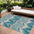 10' X 14' Teal Blue Navy Blue And Ivory Ikat Washable Indoor Outdoor Area Rug