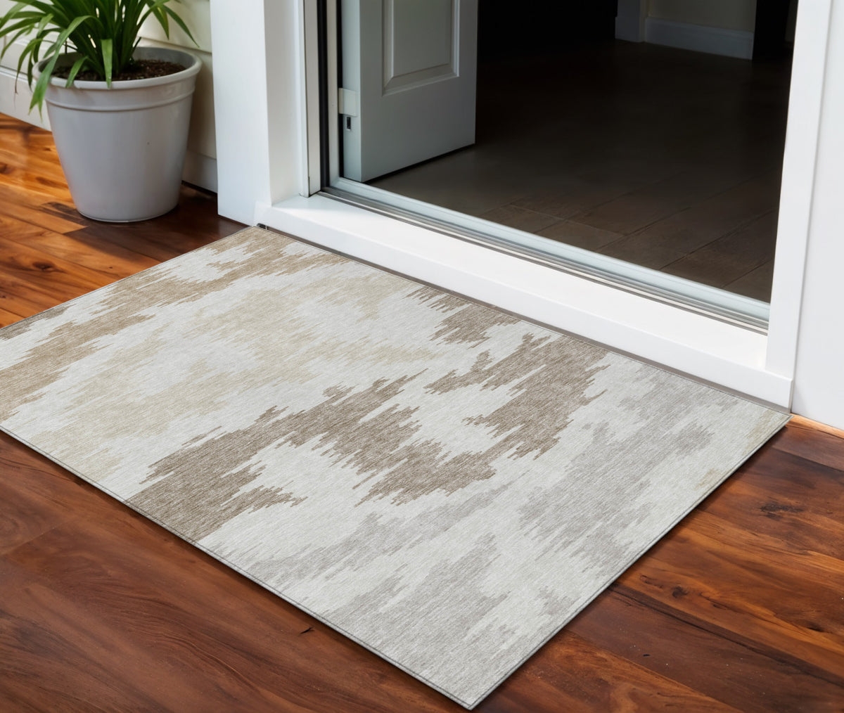 3' X 5' Ivory Beige And Brown Abstract Washable Indoor Outdoor Area Rug