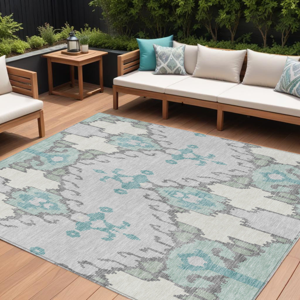10' X 14' Mint Green Teal Blue And Ivory Ikat Washable Indoor Outdoor Area Rug