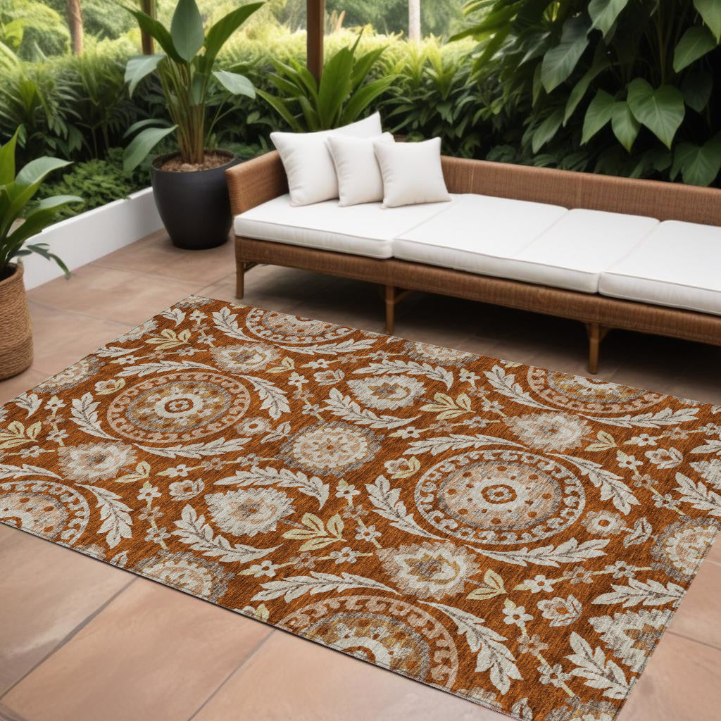 9' X 12' Orange Taupe And Gold Floral Washable Indoor Outdoor Area Rug