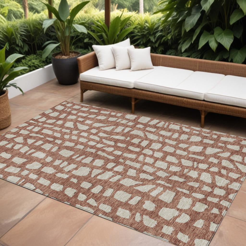 9' X 12' Orange And Ivory Abstract Washable Indoor Outdoor Area Rug