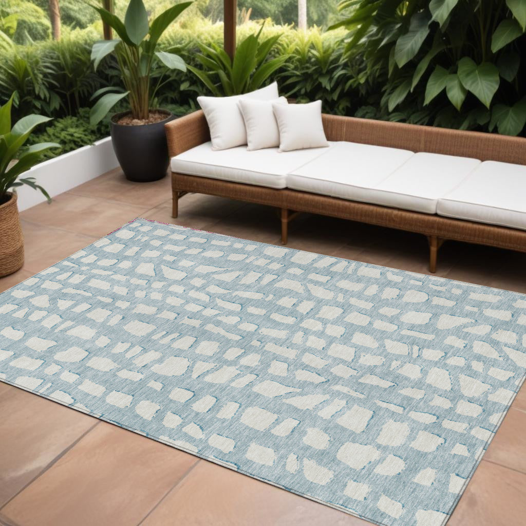 9' X 12' Sky Blue And Ivory Abstract Washable Indoor Outdoor Area Rug