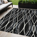 5' X 8' Black Gray And Ivory Abstract Washable Indoor Outdoor Area Rug
