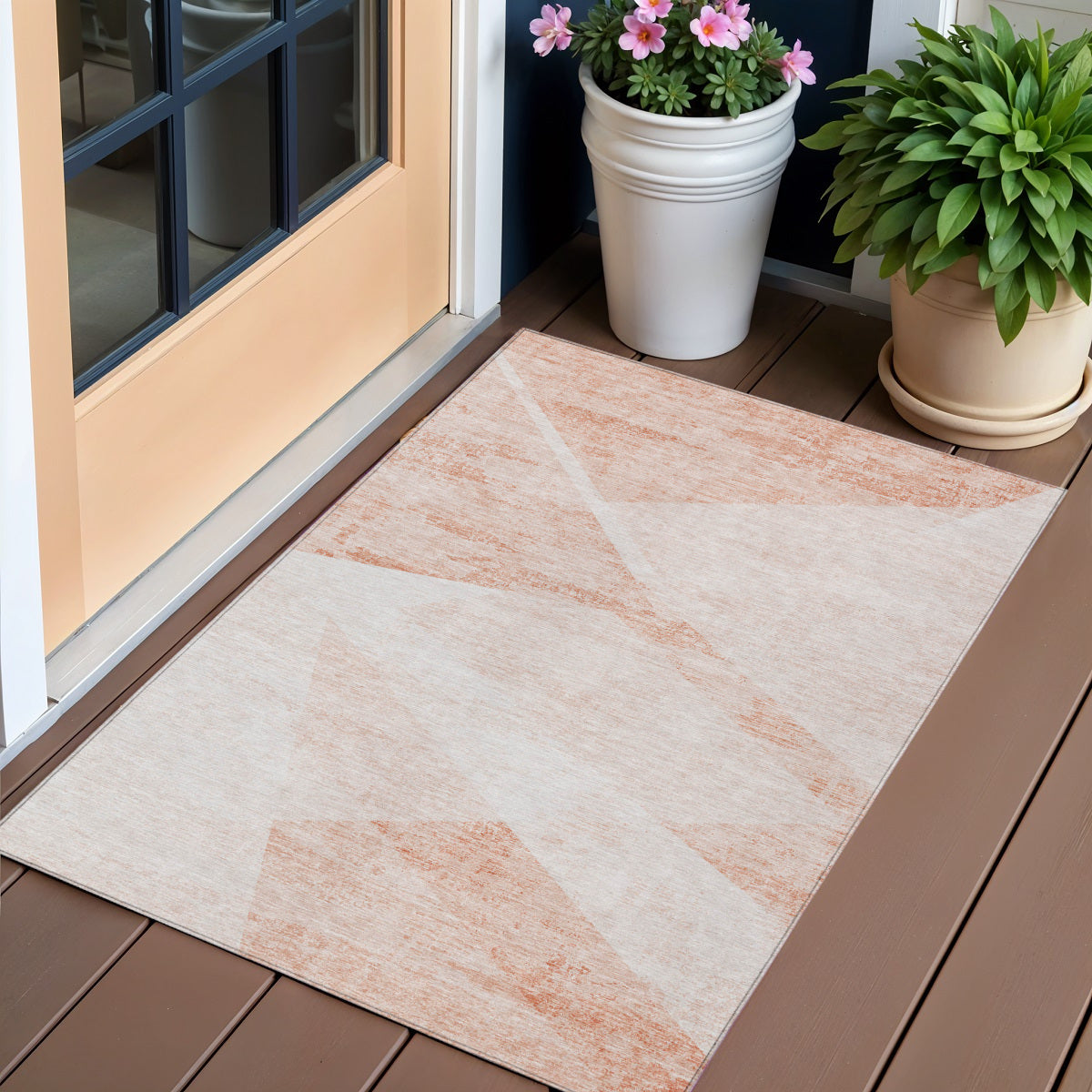 3' X 5' Salmon Peach And Ivory Abstract Washable Indoor Outdoor Area Rug