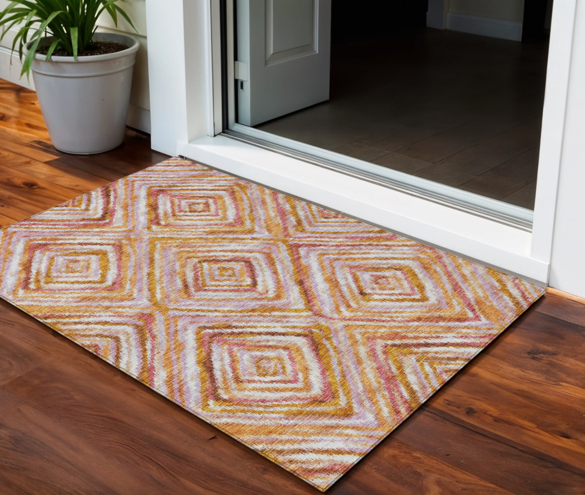 3' X 5' Orange Copper And Gold Geometric Washable Indoor Outdoor Area Rug