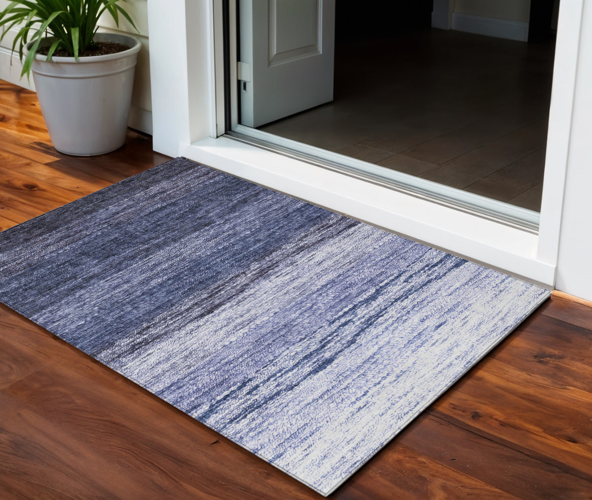 3' X 5' Navy Blue And Ivory Ombre Washable Indoor Outdoor Area Rug