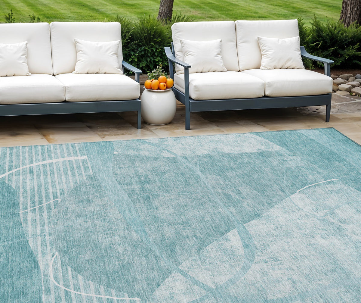 8' X 10' Turquoise Teal Blue And Ivory Abstract Washable Indoor Outdoor Area Rug