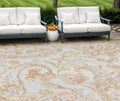 10' X 14' Coral Ivory And Peach Paisley Washable Indoor Outdoor Area Rug