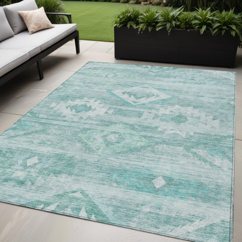5' X 8' Aqua Turquoise And Ivory Southwestern Washable Indoor Outdoor Area Rug
