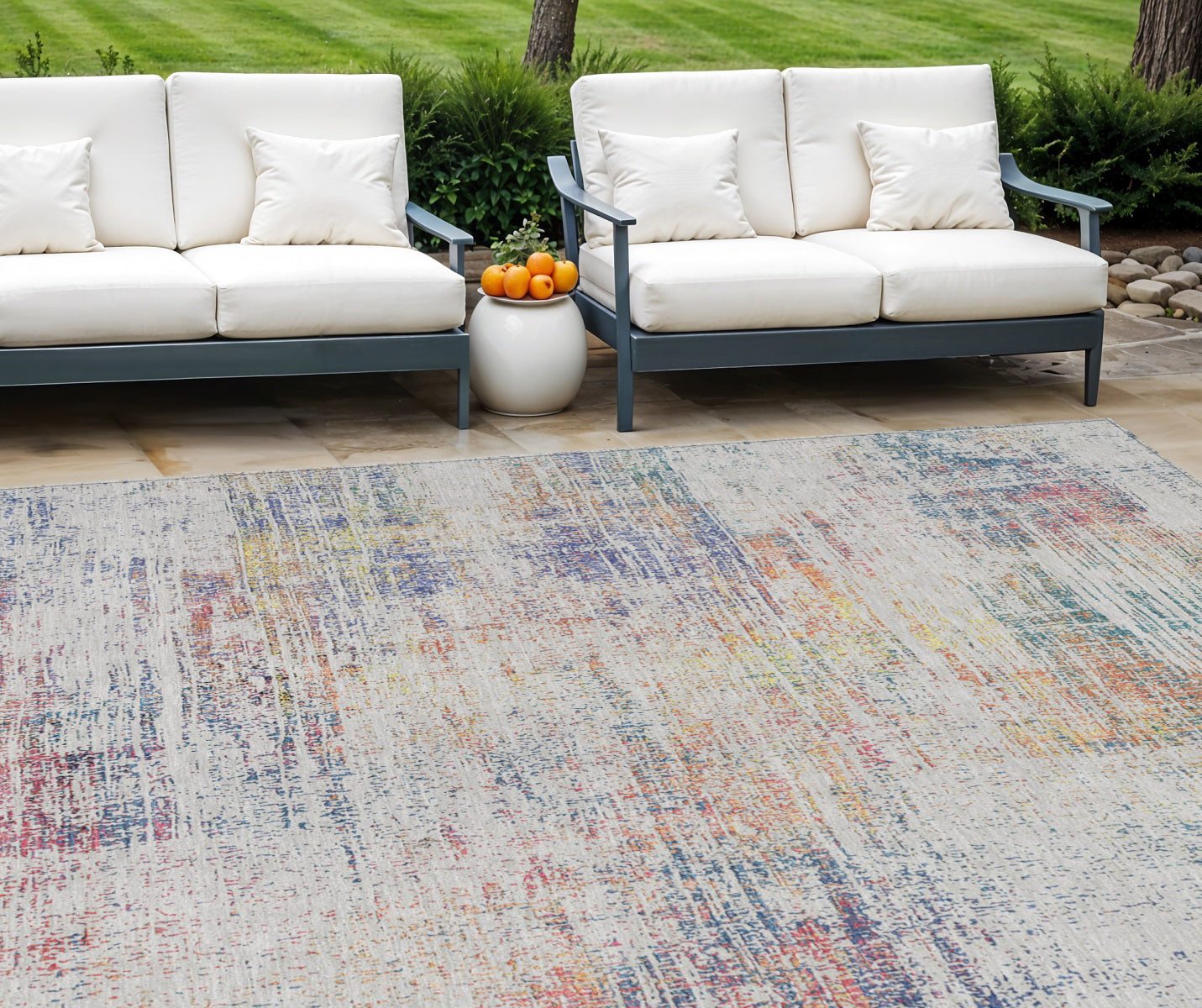 9' X 12' Ivory Orange And Blush Abstract Washable Indoor Outdoor Area Rug