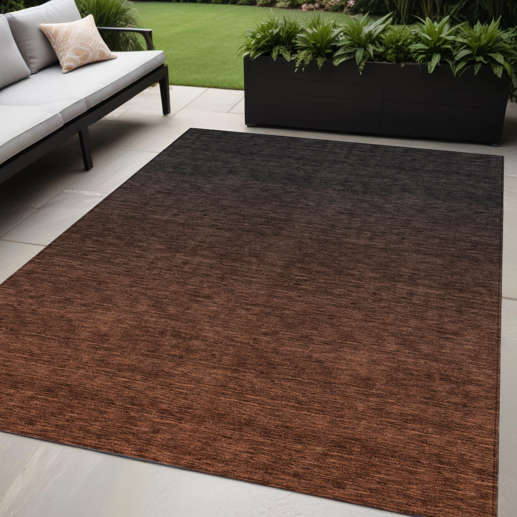 5' X 8' Orange And Charcoal Abstract Washable Indoor Outdoor Area Rug