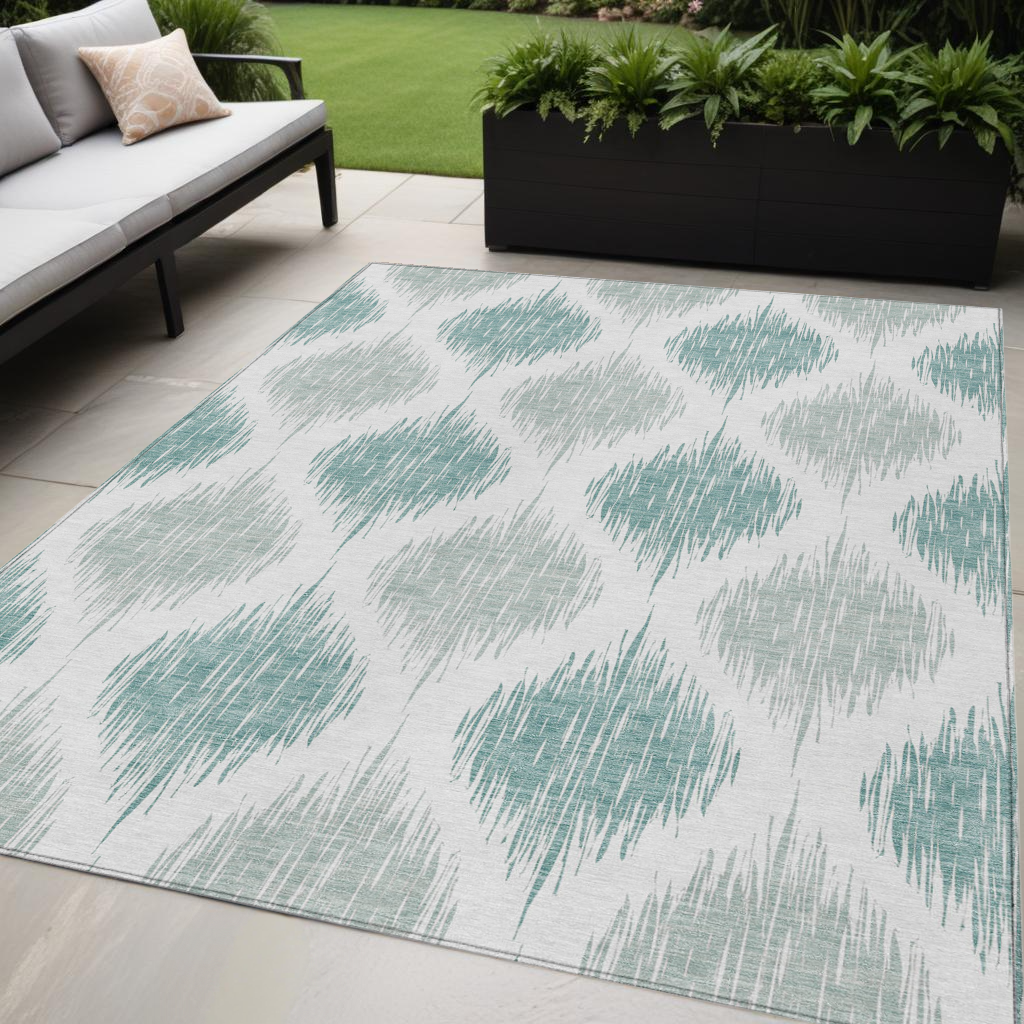 5' X 8' Aqua Teal Blue And Ivory Ikat Washable Indoor Outdoor Area Rug