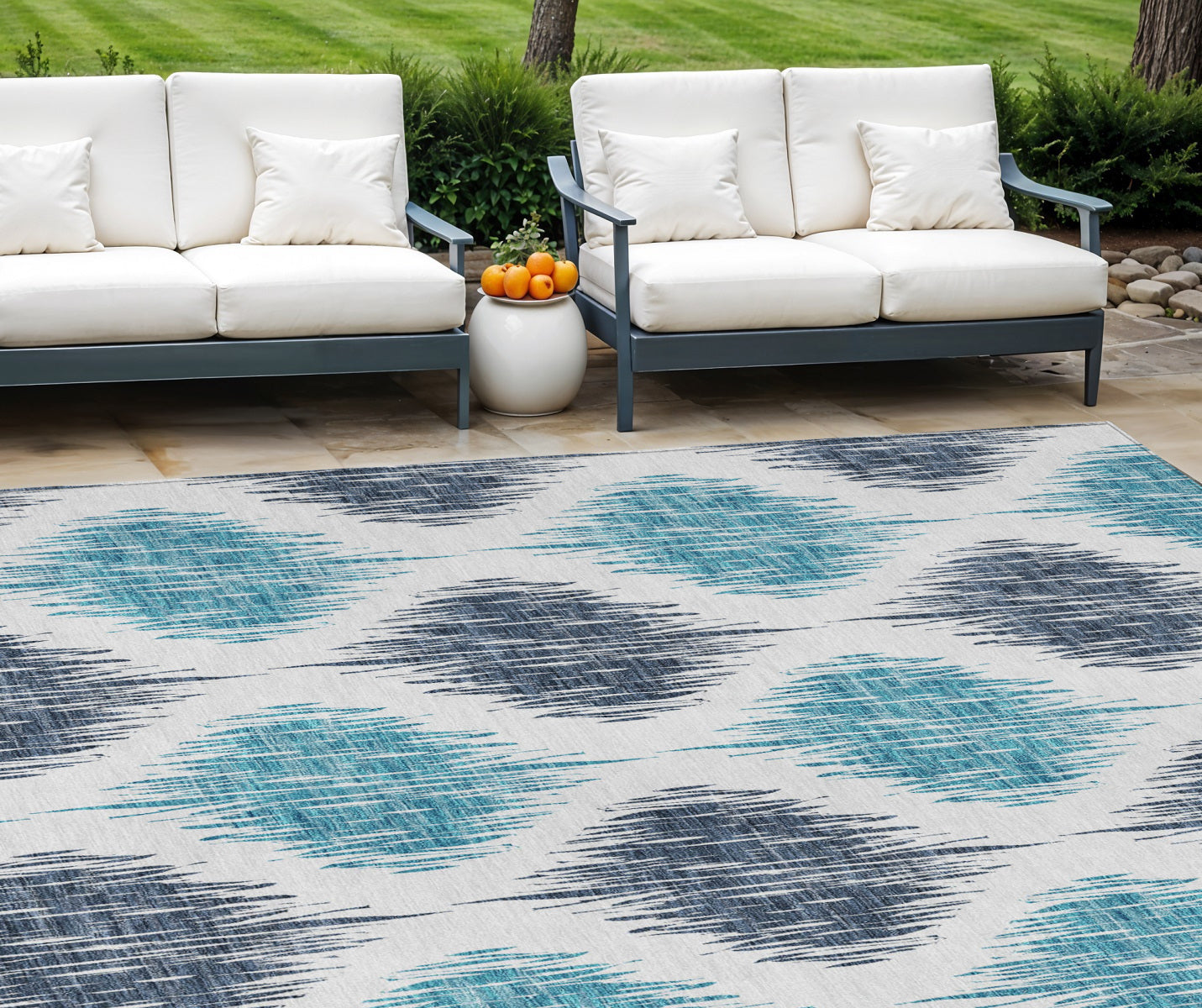 9' X 12' Teal Blue And Ivory Ikat Washable Indoor Outdoor Area Rug