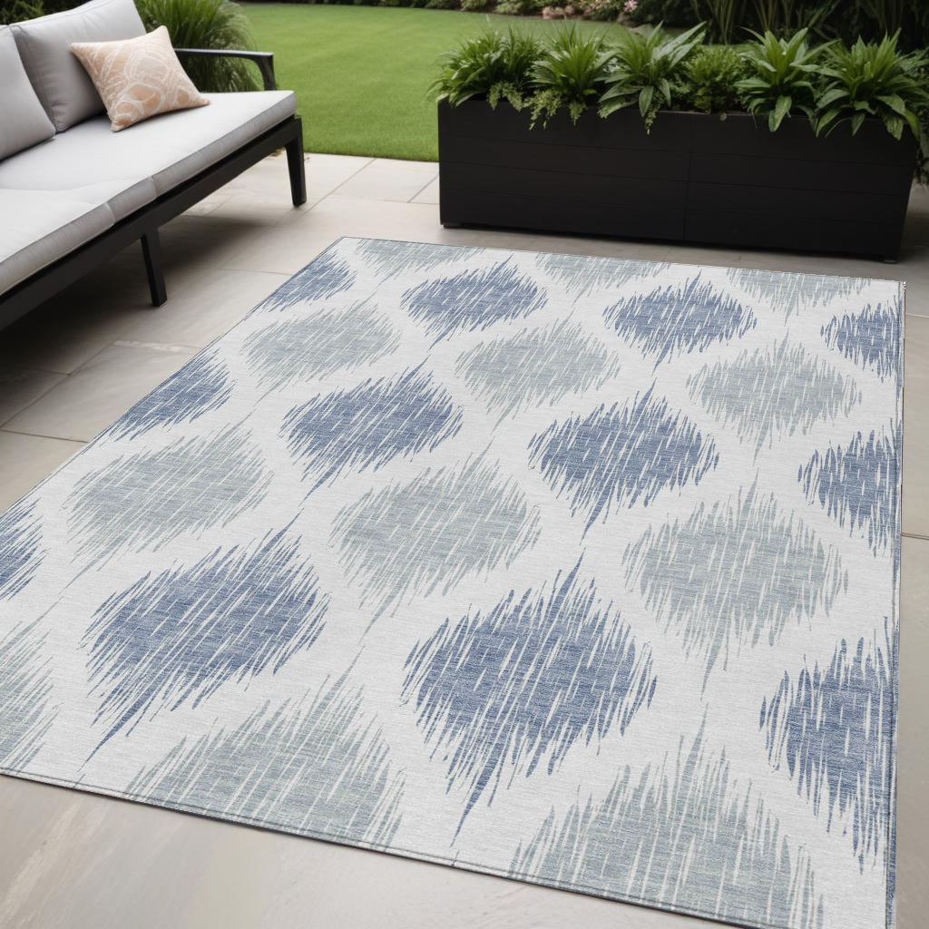 5' X 8' Sky Blue Ivory And Denim Blue Ikat Washable Indoor Outdoor Area Rug