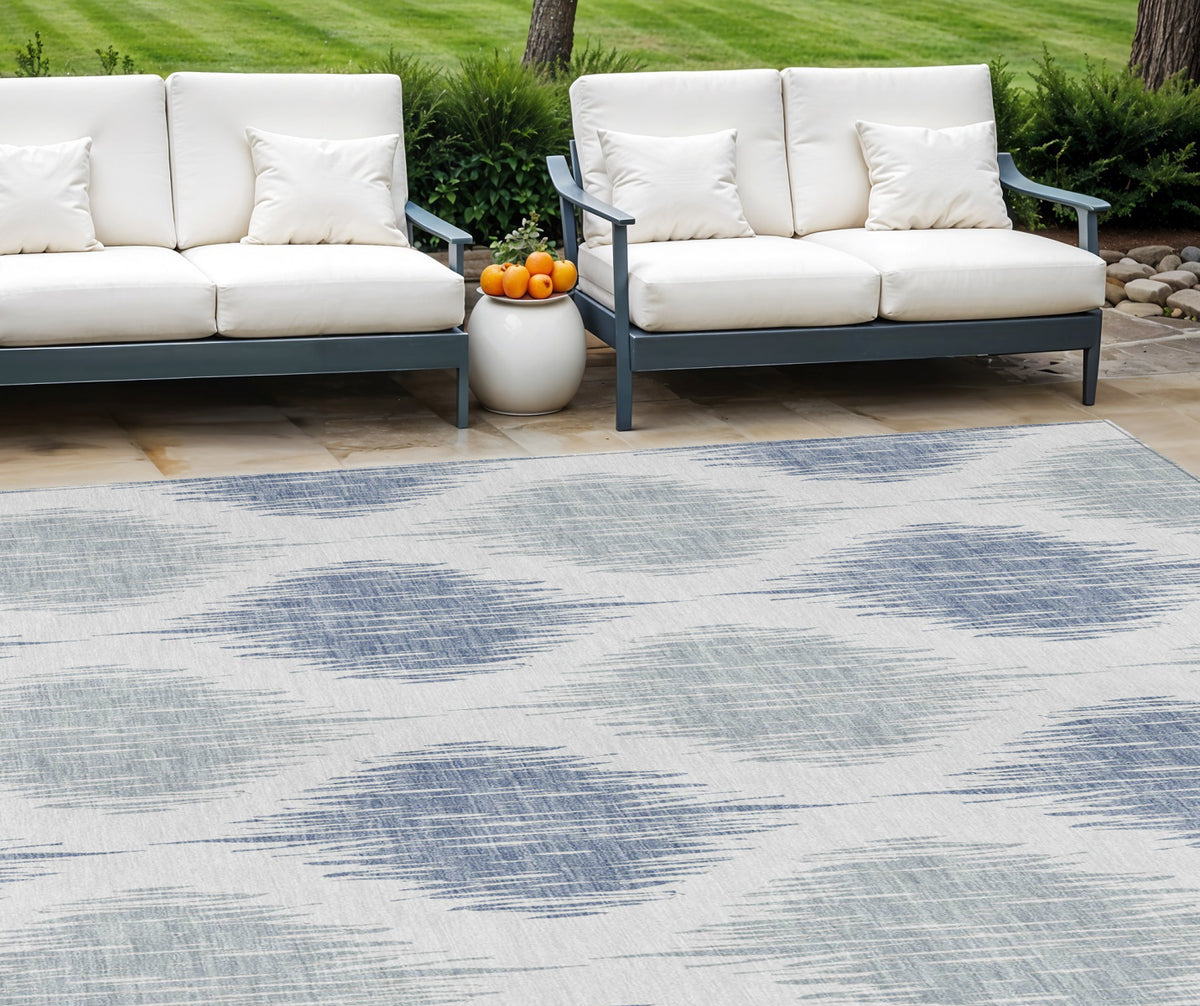 9' X 12' Sky Blue Ivory And Denim Blue Ikat Washable Indoor Outdoor Area Rug