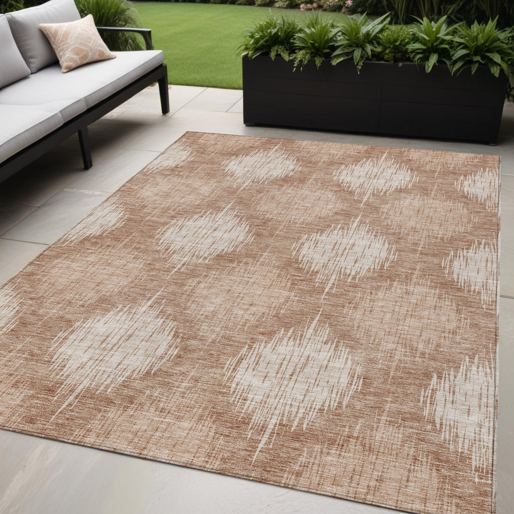 5' X 8' Coral And Terra Cotta Ikat Washable Indoor Outdoor Area Rug