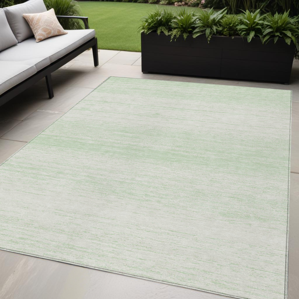 5' X 8' Mint Green And Ivory Striped Washable Indoor Outdoor Area Rug