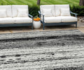 9' X 12' Black And Ivory Striped Washable Indoor Outdoor Area Rug