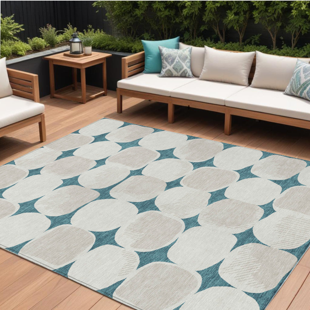 9' X 12' Teal Blue Beige And Ivory Abstract Washable Indoor Outdoor Area Rug