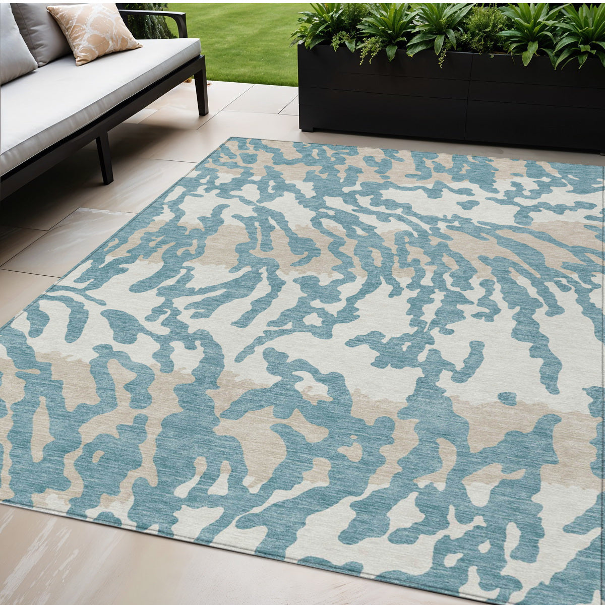 5' X 8' Teal Blue Beige And Ivory Animal Print Washable Indoor Outdoor Area Rug
