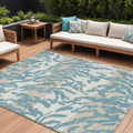 8' X 10' Teal Blue Beige And Ivory Animal Print Washable Indoor Outdoor Area Rug