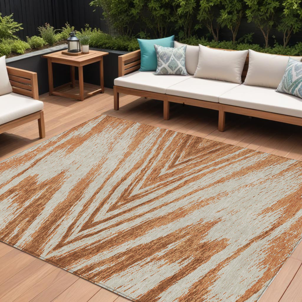 9' X 12' Orange Brown And Beige Abstract Washable Indoor Outdoor Area Rug