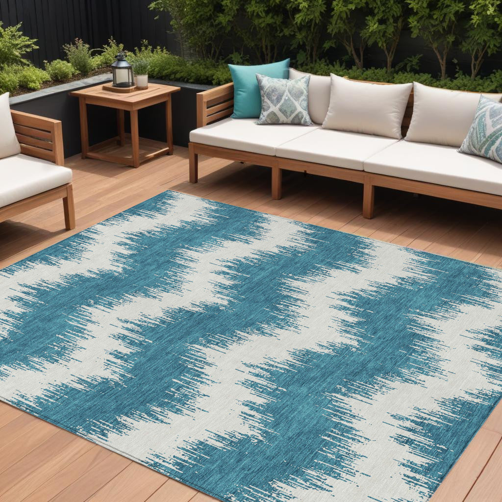 9' X 12' Teal Blue And Ivory Chevron Washable Indoor Outdoor Area Rug