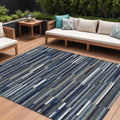 10' X 14' Navy Blue Striped Washable Indoor Outdoor Area Rug