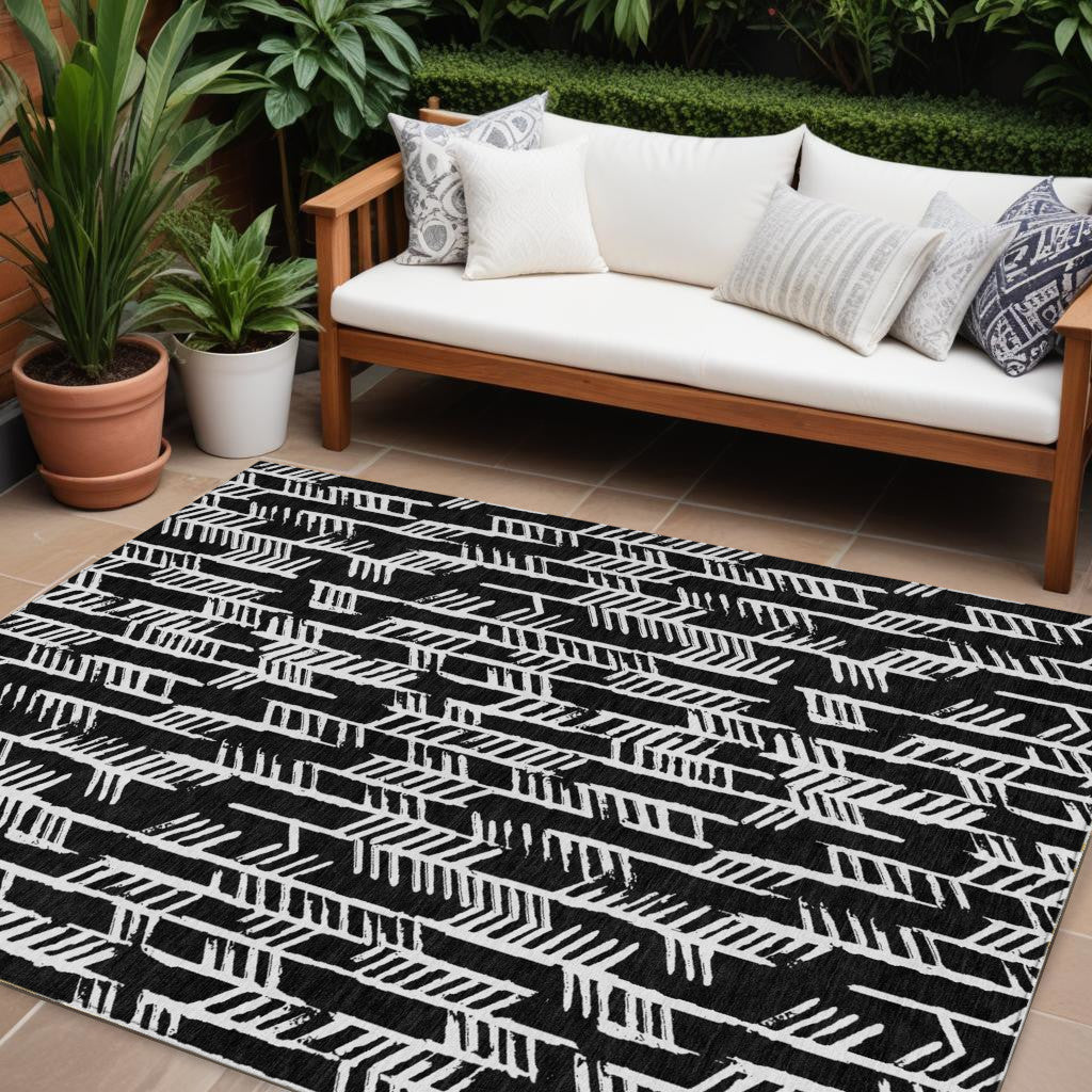 10' X 14' Black And Ivory Tribal Washable Indoor Outdoor Area Rug