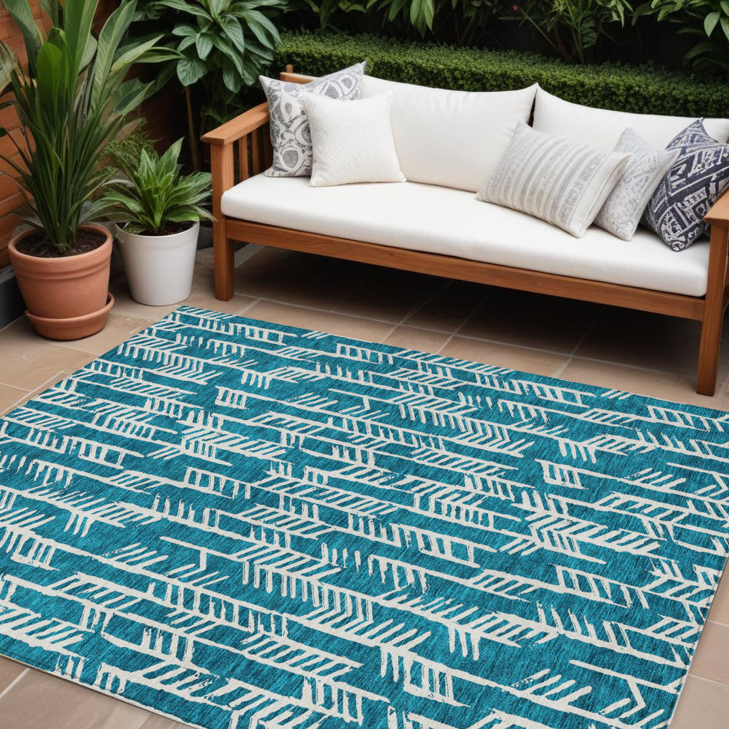9' X 12' Teal Blue And Ivory Tribal Washable Indoor Outdoor Area Rug