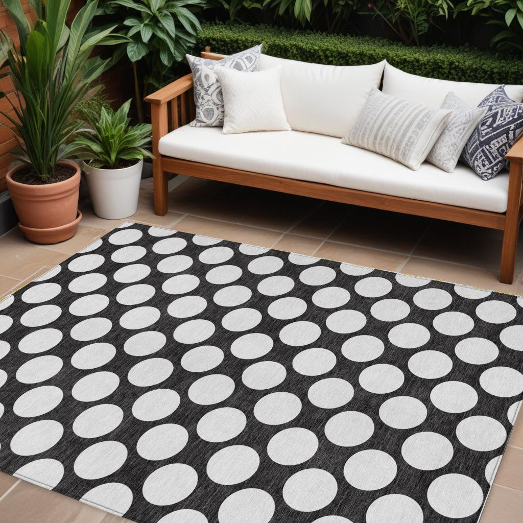 8' X 10' Black And Ivory Polka Dot Washable Indoor Outdoor Area Rug