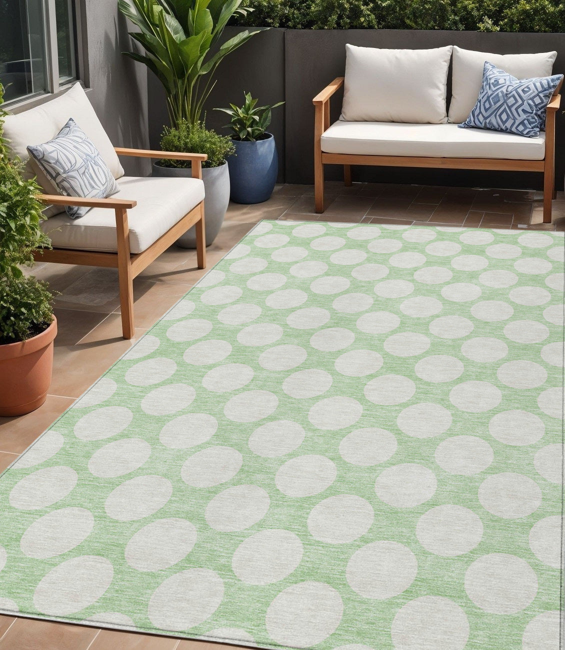5' X 8' Mint Green And Ivory Polka Dot Washable Indoor Outdoor Area Rug