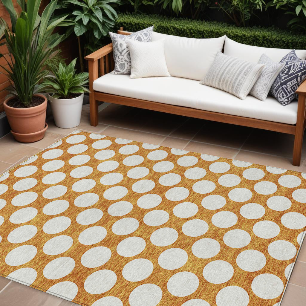 9' X 12' Orange And Ivory Polka Dot Washable Indoor Outdoor Area Rug