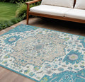10' X 14' Teal Blue Green And Ivory Oriental Washable Indoor Outdoor Area Rug