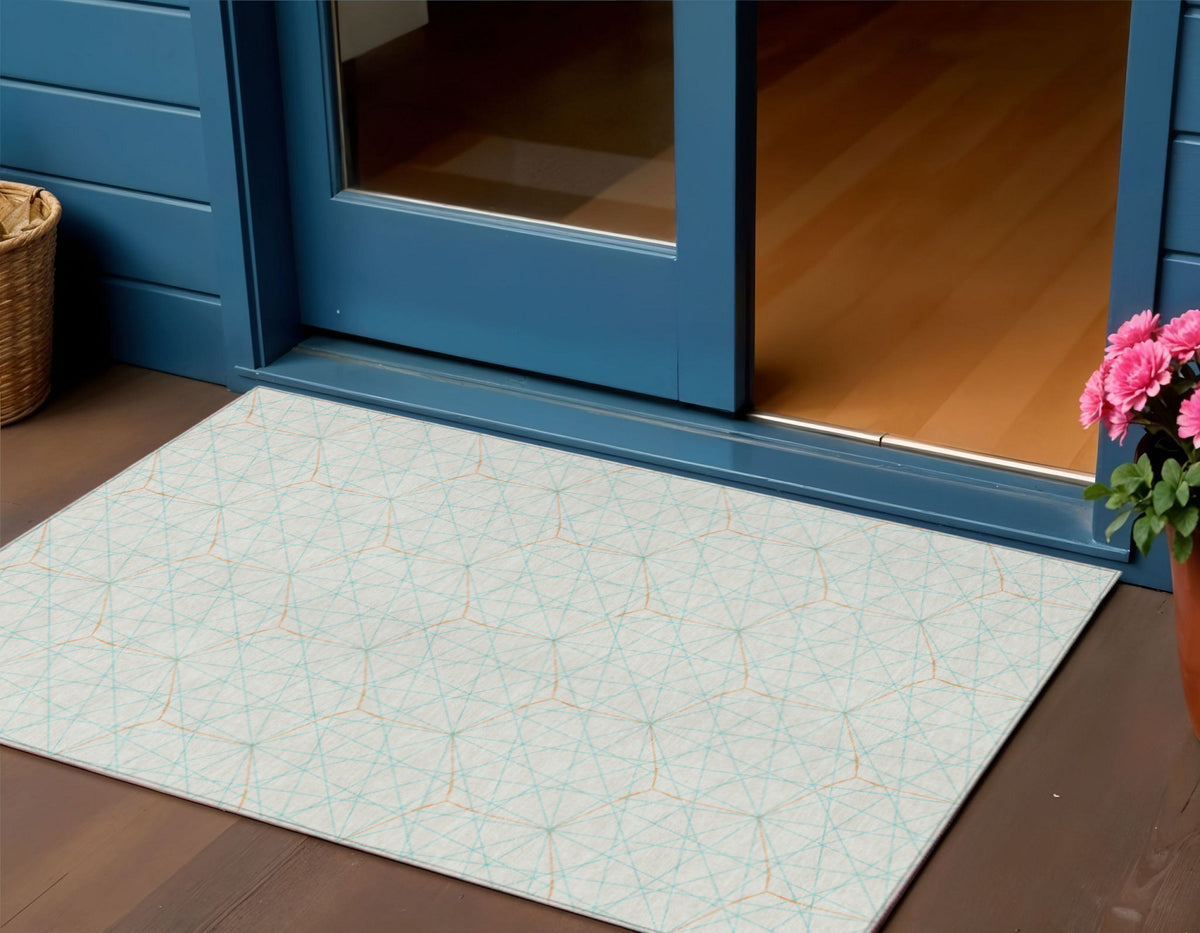 3' X 5' White Aqua And Copper Geometric Washable Indoor Outdoor Area Rug
