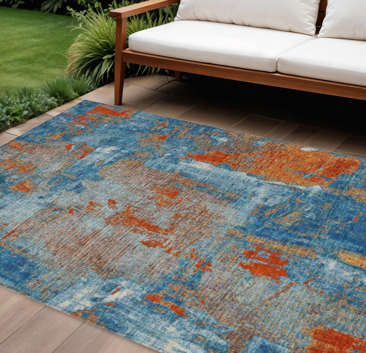 9' X 12' Navy Blue Orange And Ivory Abstract Washable Indoor Outdoor Area Rug