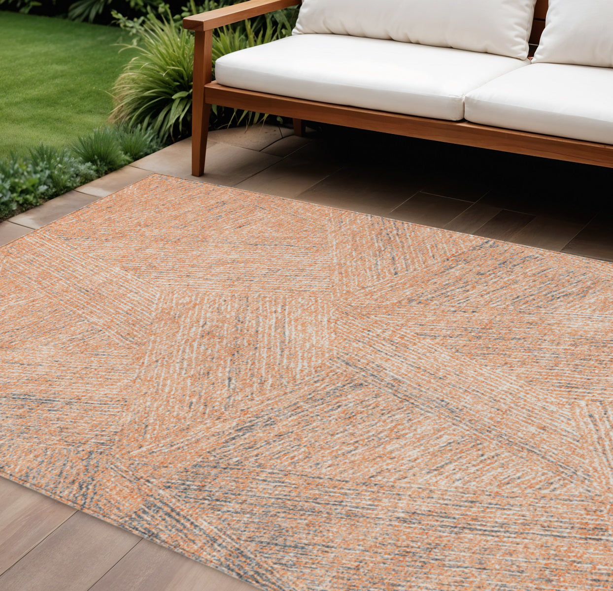 9' X 12' Peach Blue And Ivory Abstract Washable Indoor Outdoor Area Rug