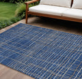 10' X 14' Navy Blue Gray And Brown Striped Washable Indoor Outdoor Area Rug