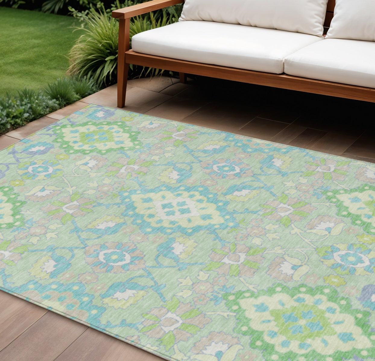 9' X 12' Mint Green Blue And Ivory Oriental Washable Indoor Outdoor Area Rug
