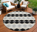 8' Black Ivory And Beige Round Geometric Washable Indoor Outdoor Area Rug