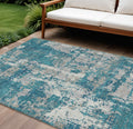 10' X 14' Teal Blue Gray And Ivory Abstract Washable Indoor Outdoor Area Rug