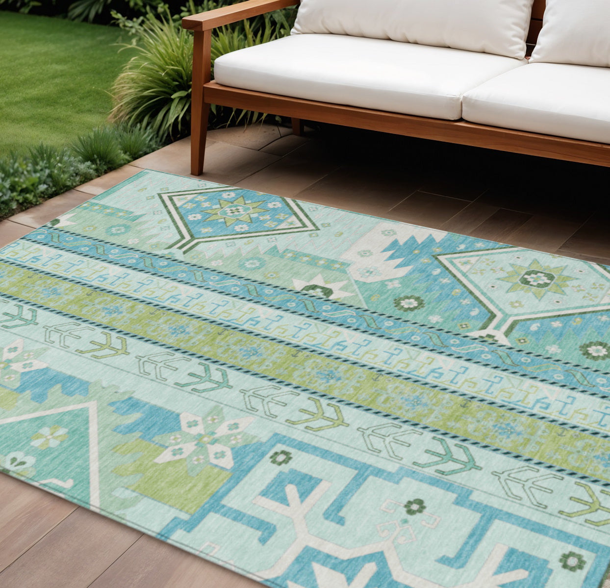 9' X 12' Mint Green Blue And Ivory Aztec Washable Indoor Outdoor Area Rug