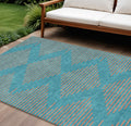 10' X 14' Teal Blue And Pink Geometric Washable Indoor Outdoor Area Rug